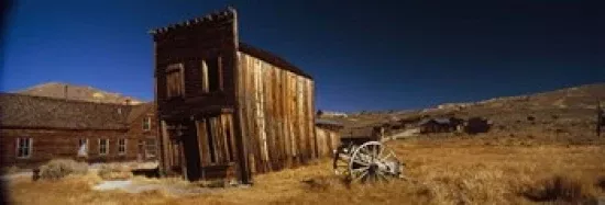 Homeric Abandoned buildings on a landscapeBodie Ghost TownCaliforniaUSA Poster Print by- 36 x 12